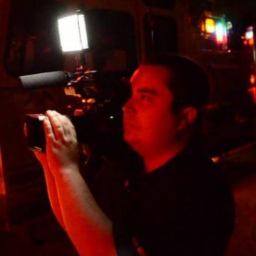 Ryan French Tampa Bay Cameraman videographer at a news scene